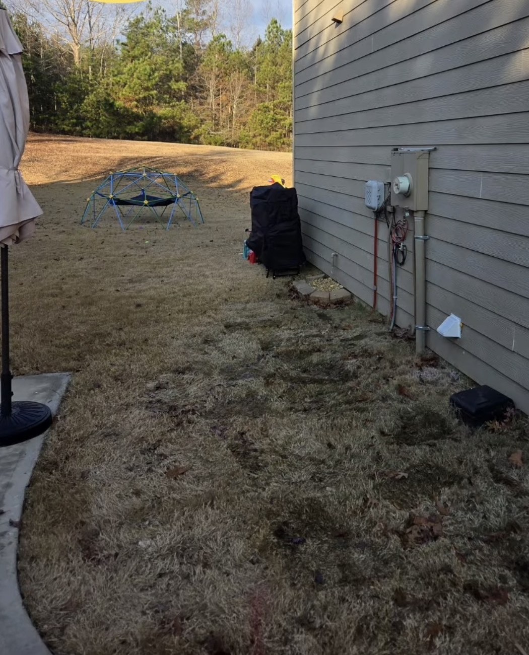 Cleared side yard after household junk removal